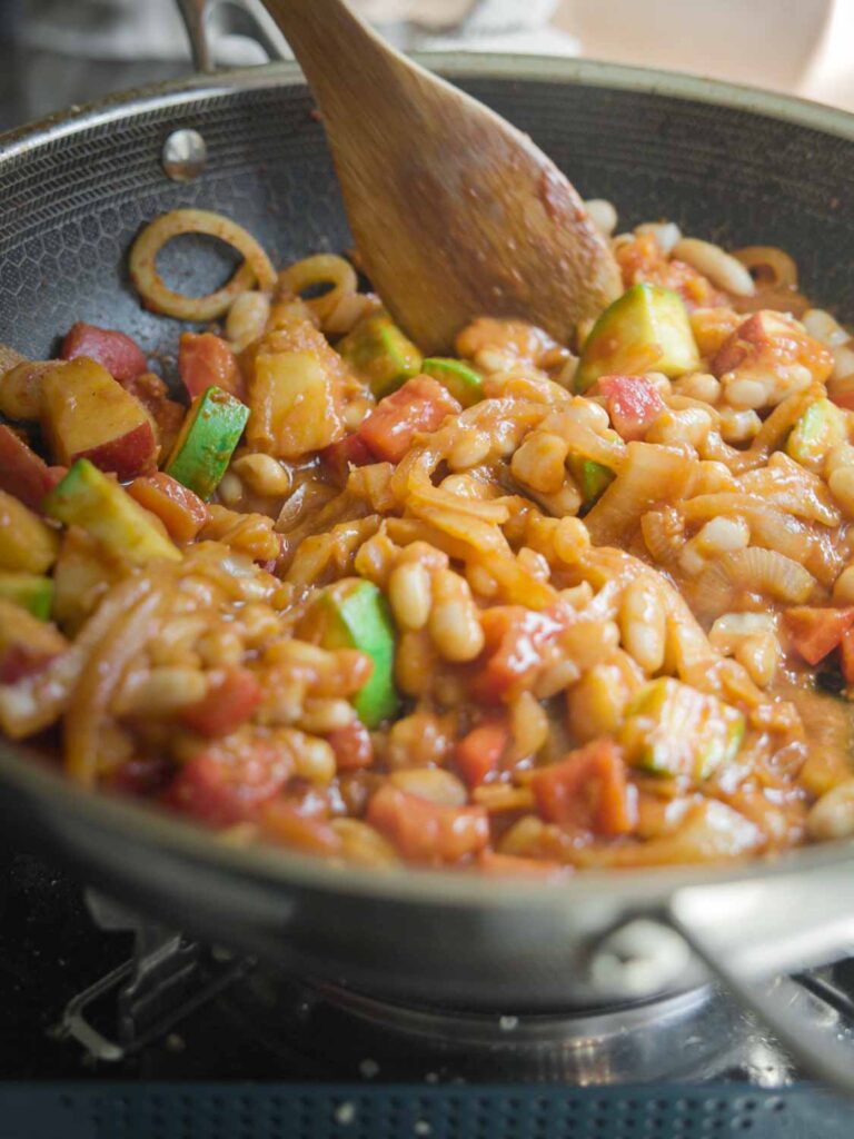 pan of veggies and bean for pumpkin curry